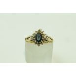 A 9 carat gold sapphire and diamond cluster ring, some settings vacant, finger size K, 1.