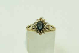 A 9 carat gold sapphire and diamond cluster ring, some settings vacant, finger size K, 1.