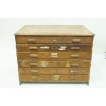 An oak plan chest in two sections with six drawers, 133.5cm high, 121cm wide, 83.