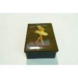 A Russian lacquer box, the front painted with ballerina, marked "Made in USSR", 15.