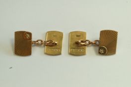 A pair of 9 carat gold and diamond cufflinks, London 1956,