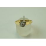 A single stone illusion set diamond 18 carat gold ring, finger size P 1/2, 3.