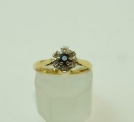 A 9 carat gold sapphire and single cut diamond cluster ring, finger size L 1/2, 2.