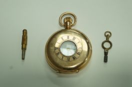 Waltham, a gilt metal half hunter pocket watch, signed enamel dial,