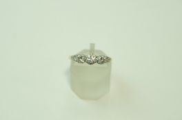 A three stone diamond ring, stamped '18ct & Plat',