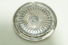 A silver dish, Sheffield 1939, circular with a shaped inner border, 16 cm diameter, 161 g (5.