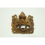 A Burmese carved rosewood wall mask, in the form of a dragon with open mouth,