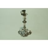 A George II cast silver taper stick, maker J.S.