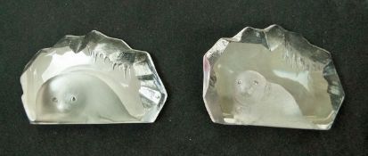 A pair of Swedish glass ornaments each moulded and frosted with intaglios of seals, etched marks,
