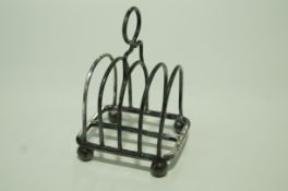 A Scottish silver toast rack, by Mackay & Chisholm, Edinburgh 1902, of four division,