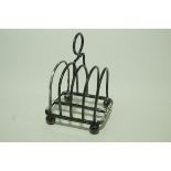 A Scottish silver toast rack, by Mackay & Chisholm, Edinburgh 1902, of four division,