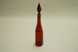 A Victorian Bohemian cut glass decanter and stopper with ruby flash,