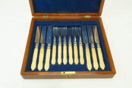 A Victorian set of six ivory handled close plate dessert knives and forks,