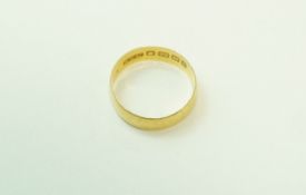 A 22 carat gold wedding ring, of flat section, 5 mm wide, finger size O, 2.