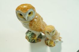 A Beswick figure of an owl, impressed factory marks, 19cm high and one other, printed factory marks,