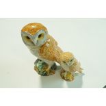 A Beswick figure of an owl, impressed factory marks, 19cm high and one other, printed factory marks,