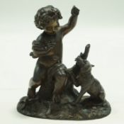 A bronze figure of a putti seated on a branch with a dog at his feet,