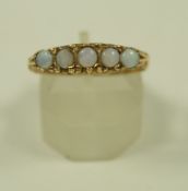 A 9 carat gold five stone opal ring, finger size S1/2, 3.