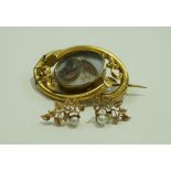 A mid Victorian hair panel brooch, inscribed for 1853,