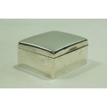 A silver cigarette box, of plain rectangular form, wooden lined, 10.