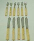 A silver set of five fish knives and six forks by Mappin and Webb, Sheffield 1926,