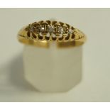 An 18 carat gold five stone diamond ring, set with graduated Swiss cuts, finger size O, 3.