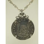 A silver 8 redes "Pillar Dollar", dated 1737, Hollandia, in a pendant mount and on a chain,
