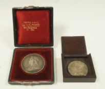 An 1893 Victorian silver Crown and a George VI Coronation coin