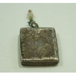 A Victorian rectangular silver locket, unmarked,