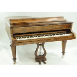 A Collard & Collard rosewood grand piano with square tapering legs on brass and ceramic casters