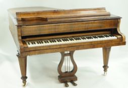A Collard & Collard rosewood grand piano with square tapering legs on brass and ceramic casters