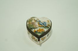 A Dutch Delft heart shaped box and cover painted with a lady in a landscape with metal mounts 7cm