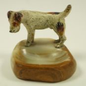 A 20th century cold painted figure of a terrier on a hardstone base, 6.
