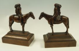 Two bronze figures of native Americans on horseback,