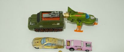 Four Dinky toys, a Shao 2 Ed Strakers car,