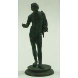A bronze figure of Apollo, after the antique on round base. 26.5cm high.