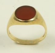 A 9 carat gold carnelian signet ring, finger size S, 5.