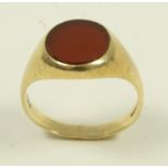 A 9 carat gold carnelian signet ring, finger size S, 5.