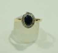 A sapphire and diamond ring, stamped '375',