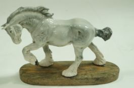 An unusual Beswick dapple grey shire horse on wooden plinth,printed factory marks in black,