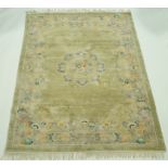 A Chinese silk rug,
