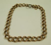 Part of a 9 carat gold graduated curb link watch chain,