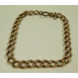 Part of a 9 carat gold graduated curb link watch chain,