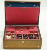 A Victorian rosewood rectangular work box inlaid with mother of pearl and metal stringing,