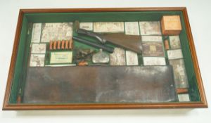A modern gun related display wall hanging with leatehr gun case,