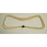 A two row graduated cultured pearl necklace, the 100 and 91 pearls of approximately 2.9 mm to 7.