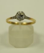 A diamond single stone ring, stamped '18ct',