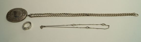 A large oval silver locket,