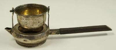 A silver tea strainer, maker F.