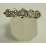 A five stone diamond ring, the white mount unmarked,